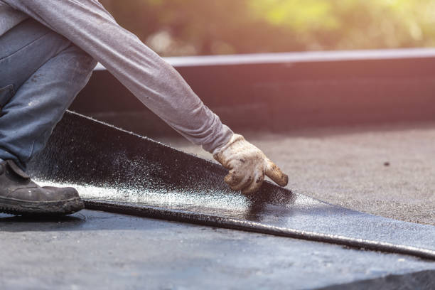Professional Basement Waterproofing technician working in Albany, OR